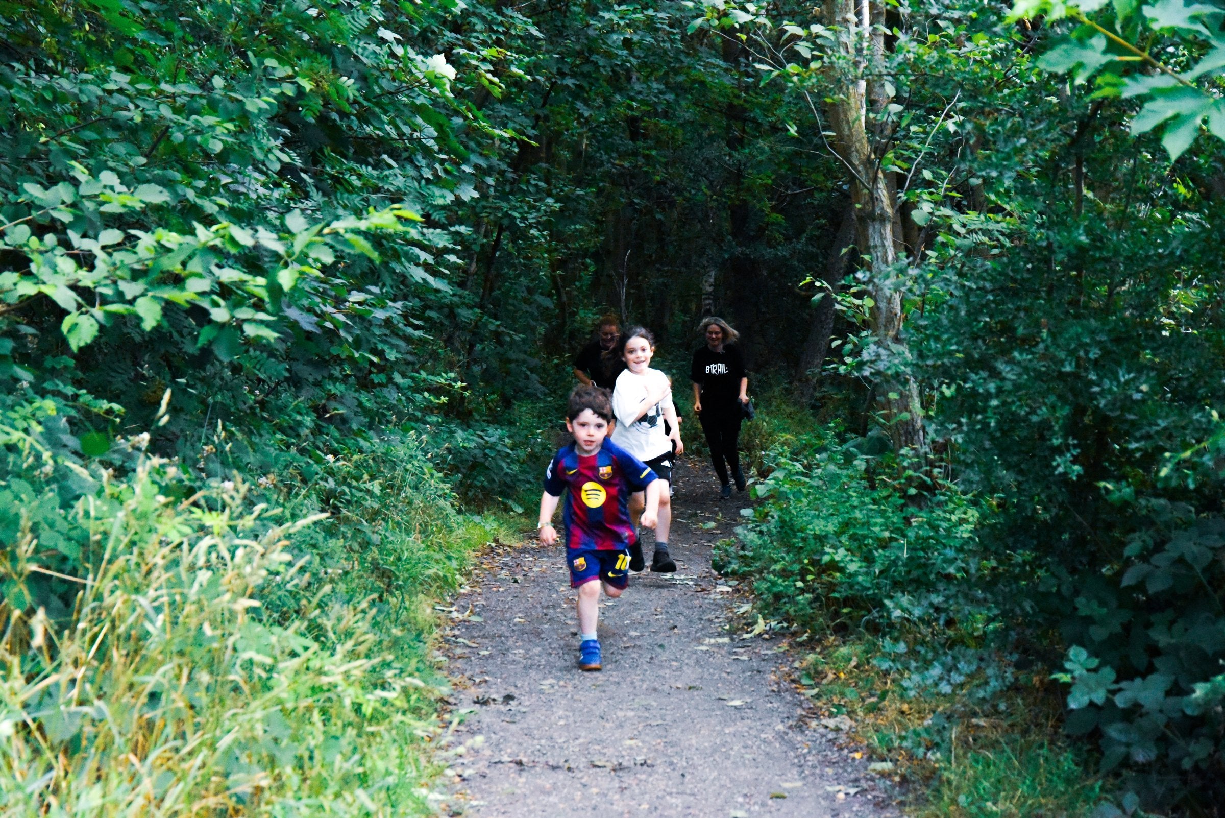 Family runners on the Tanfield woodland trail